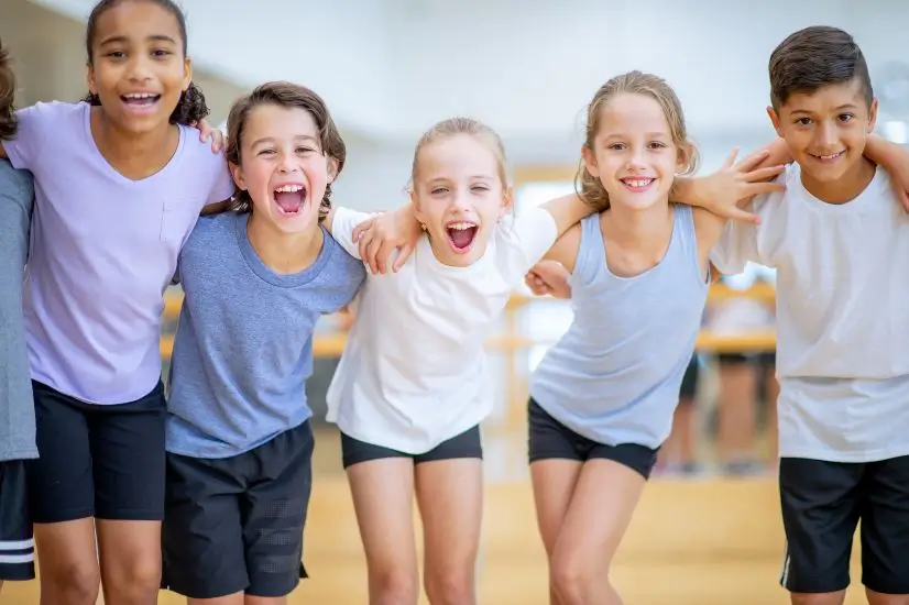 Diverse group of children at YMCA gym