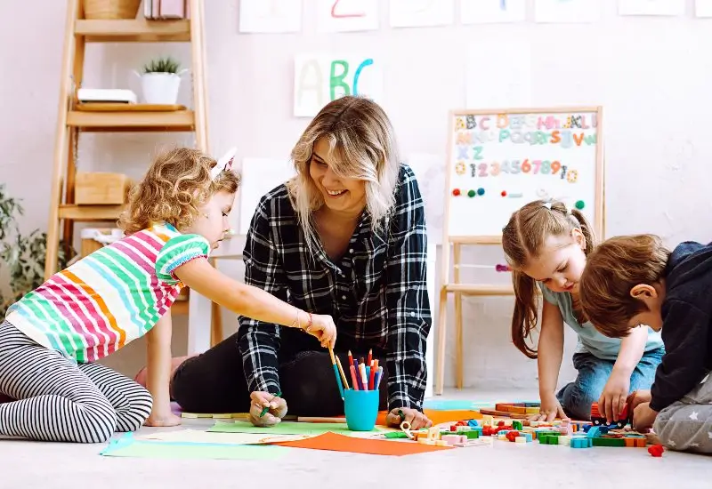 Teacher teaching kids colors and ABC’s