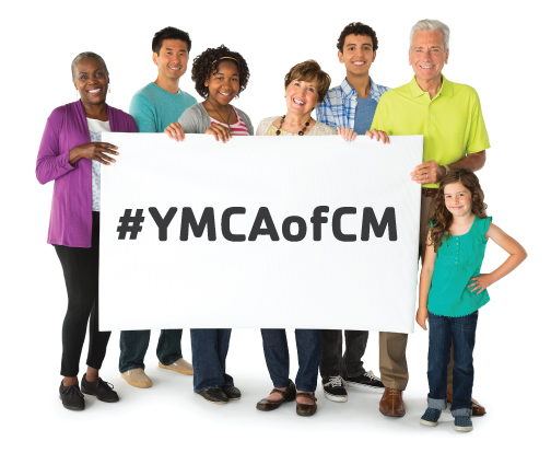 A group of people holding a sign board that says, "#YMCAofCM."